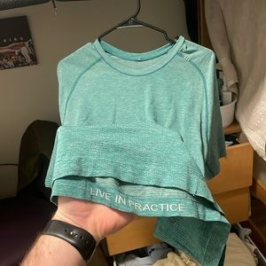 Lot of men’s medium lulu medium size shirts with a pair of lulu shorts large